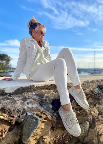 Shani Crystal Leather sneakers - stunning women's casual sneakers from Ameise.  In a soft Pistachio colour, the all leather upper is studded with crystals along the side and trimmed with a silver band. 