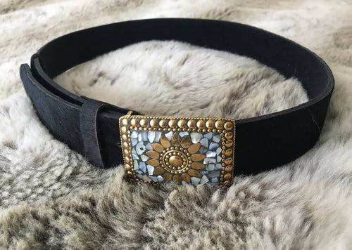 Real cow hide leather belts, in black with an ornate buckle with detailed Mother of Pearl inlay.   Can be worn loose or fitted