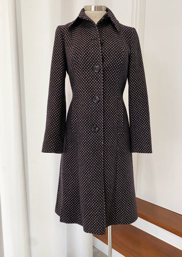      Brand: NEXT     Circa: 1990     Style: tailored wool blend 3/4 length fitted coat     Preloved     Colour: dark grey with delicate pink dots     Fabric: 100% pure new wool, lining Acetate     lined     dry clean     Size UK 8 or 36