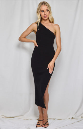 The Monaco One Shoulder Dress by Winnie & CO, in a rich black knit, everyone agrees this dress will be a stunning addition to your robe.  In a classic one shoulder design that never goes out of fashion, it is a dress you can go to again and again when the occasion calls for that LBD!   The figure hugging comfortable knit dress skims over the body flattering the figure, and the cheeky one shoulder design with a split to the thigh is sure to turn heads.  