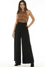 Load image into Gallery viewer, Made for effortless elegance, these Rayon Mar tailored wide leg trousers in black will take you effortlessly from desk to dinner !  Lightweight with an elegant high waist, these pants feature 2 front pockets and a flattering tailored fit.  The high waist lengthens the silhouette and the lightweight fabric is both comfortable and cool and floats elegantly with every move.  Wear with a silk blouse to the office or with an off the should top and jacket,
