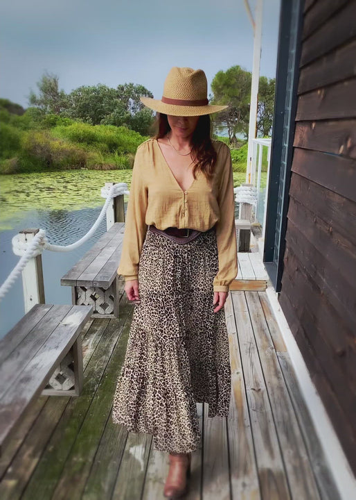 The Kitty Skirt in a gorgeous leopard print, will be a seasonal favourite in your robe.  The long flowing tiered skirt is relaxed with a sheared waist with drawstring and the Rayon fabric is lightweight and cool, perfect no matter where you wear it, day or night.  