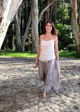 Load and play video in Gallery viewer, Fashion loves a little romance!  Discover your love for Italian made fashion with the Primadonna Feather Singlet by Jenny Jazz!   This soft raw cut silk is tiered on the front, with a delicate sequin neckline to add a touch of feminine glamour to any outfit. 
