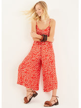 Load image into Gallery viewer, The perfect jumpsuit to pack on holiday, or those days when you cant decide what to wear!  It will take you effortlessly from beach to lunch or desk to dinner!  Beautiful lightweight Rayon voil fabric is cool and comfortable and looks sensational in the swirling coral print which floats elegantly with every move. 
