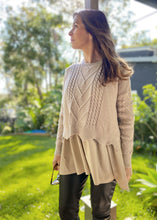 Load image into Gallery viewer, The Winnie Knit Shirt by Bagira is a stylish knitted jumper with a combined shirt layer for a unique layered look.  In a gorgeous soft Latte colour, the beautiful cable knit is finished with a very pretty scalloped edge, and pattern detail down the arms.  The cotton under shirt is oversized and gathered, creating a very luxurious Boho style top that pairs well with jeans, trousers or leggings.   

