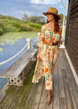 Load image into Gallery viewer, The beautiful Ravello floral print Isla Maxi Dress by Caro The Label.  The gorgeous print in autumnal colour palette represent the colours of Australian flowers!  The long loose flowing skirt skims the body flattering the figure.
