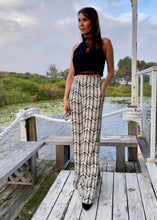 Load image into Gallery viewer, Made for effortless elegance, these Rayon Mar tailored wide leg trousers in trousers in an abstract graphic design of black/off white, will take you effortlessly from desk to dinner !  Lightweight with an elegant high waist, these pants feature 2 front pockets and a flattering tailored fit.  The high waist lengthens the silhouette and the lightweight fabric is both comfortable and cool and floats elegantly with every move.
