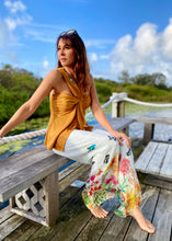 Load image into Gallery viewer, Feel effortlessly elegant in these Italian floral silk pants.  The loose cut drape to create a relaxed and elegant silhouette,  The sheer printed silk trousers have a soft comfortable inner lining

