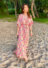 Load image into Gallery viewer, The Beatrice Dress -  the long loose flowing skirt lightly skims the body flattering the figure.  The silk blend fabric is lightweight and cool. The skirt is split at the sides to the knee and the V neckline crosses the bust with a drawstring tie under the bust, creating a flattering silhouette.  Finished with wide short bell sleeves, you will feel utterly feminine in the pretty floral print. 
