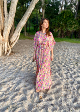 Load image into Gallery viewer, The Beatrice Dress -  the long loose flowing skirt lightly skims the body flattering the figure.  The silk blend fabric is lightweight and cool. The skirt is split at the sides to the knee and the V neckline crosses the bust with a drawstring tie under the bust, creating a flattering silhouette.  Finished with wide short bell sleeves, you will feel utterly feminine in the pretty floral print. 
