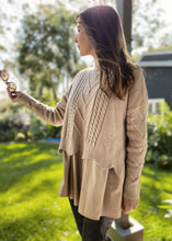 Load image into Gallery viewer, The Winnie Knit Shirt by Bagira is a stylish knitted jumper with a combined shirt layer for a unique layered look.  In a gorgeous soft Latte colour, the beautiful cable knit is finished with a very pretty scalloped edge, and pattern detail down the arms.  The cotton under shirt is oversized and gathered, creating a very luxurious Boho style top that pairs well with jeans, trousers or leggings.   
