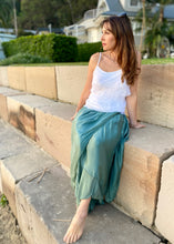 Load image into Gallery viewer, Fashion loves a little romance!  Discover your love for Italian made fashion with the Primadonna Feather Singlet by Jenny Jazz!   This soft raw cut silk is tiered on the front, with a delicate sequin neckline to add a touch of feminine glamour to any outfit. 
