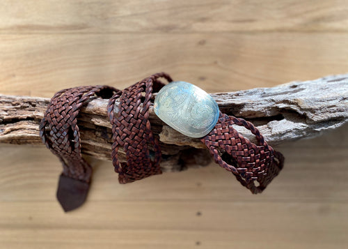 Add a bit of bohemian styling to your wardrobe with the beautifully woven Marrakesh Leather Belt.  With an engraved metal oval shape buckle and beautifully detailed leather weave, this belt will be the focus of your outfit.   