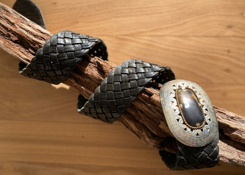  The beautiful Marrakesh Wide Leather Belt is a 6cm wide woven leather belt with an oval bone inlay set in an engraved metal buckle.   A real show stopper, looks sensational with any outfit.