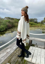 Load image into Gallery viewer, The Layla Slouch Jumper by Bagira is a stunning oversized knitted jumper in a gorgeous cream and caramel cotton blend. The casual slouch style is both sassy and classy at once, this jumper has a trendy street credability.  With wide sleeves and extra long panels at the back, it is casual and feminine and looks fabulous paired with jeans, leather pants, leggings, or a mini and high boots
