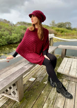 Load image into Gallery viewer, This soft Mohair/acrylic knitted Cap exudes a sassy, bohemian style.  Knitted in a light weight yarn, the pretty knit features a ribbed pattern in a generous slouchy style.  It is sure to keep your pretty head snug, warm and stylish through winter and spring!  Wear it with our Mohair blend Poncho.
