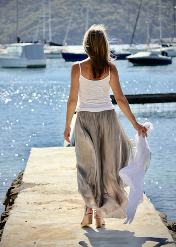 The Celine pants - loose cut flowing silk is so light and drapes to create an elegant silhouette.  The movement in the fabric is a pure delight, and floats with every move.  Designed with comfort in mind, the legs are lined with cotton, and the thick, jersey waistband sits comfortably at the waist.   Both sophisticated yet bohemian, the Celine pants will add a touch of the exotic to your wardrobe. 