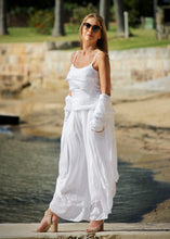 Load image into Gallery viewer, The Polly Pocket Pants are a gorgeous bohemian silk pant made from Italian silk blend.  With pockets on the sides, and a flowy silk layer over cotton lining.  Light weight and flattering, these elegant pants, are lux boho, whether you wear with heals or flat slides.
