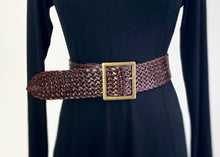 Load image into Gallery viewer, The Marrakesh Wide T Bar Classic Buckle Belt is a 7cm wide woven from rich chocolate leather.  The buckle is a simple square T buckle crafted from Brass . Wear over your favorite maxi dress or linen outfit.  Can be worn at the waist or on the hips. 
