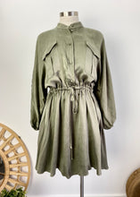 Load image into Gallery viewer, Brand: Shona Joy Circa: 2019 Style: relaxed voluminous fit, with drawstring at waist, mandarin collar, buttoned to waist, balloon sleeves, finishing above the knee Preloved: yes Colour: Olive Fabric: 69% Cupro / 31% Viscose Size 10 (Aus)
