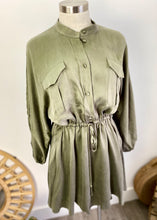 Load image into Gallery viewer, Brand: Shona Joy Circa: 2019 Style: relaxed voluminous fit, with drawstring at waist, mandarin collar, buttoned to waist, balloon sleeves, finishing above the knee Preloved: yes Colour: Olive Fabric: 69% Cupro / 31% Viscose Size 10 (Aus)
