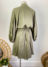Load image into Gallery viewer, Brand: Shona Joy Circa: 2019 Style: relaxed voluminous fit, with drawstring at waist, mandarin collar, buttoned to waist, balloon sleeves, finishing above the knee Preloved: yes Colour: Olive Fabric: 69% Cupro / 31% Viscose Size 10 (Aus)
