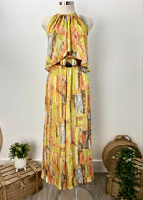 Load image into Gallery viewer,       Brand:  Elliatt     Circa: 2011/2012     Style: flowing wide leg halter neck jumpsuit     Lined: no     Preloved: yes     Colour: yelllow     Fabric: Polyester     Hand wash only     Size 10 (Aus)     Length  143cms  All items are clean, but if you require a dry-clean receipt, the cost will be in addition.
