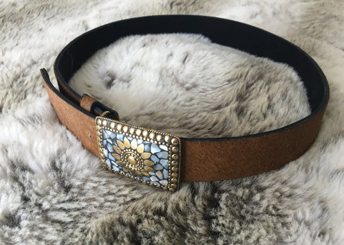 Real cow hide leather belts, in tan with an ornate buckle with detailed Mother of Pearl inlay.   Can be worn loose or fitted