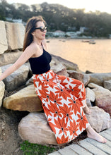 Load image into Gallery viewer, The vibrant and elegant Lime Culottes are crafted from a beautiful Rayon Voil material, in a stunning bespoke print by Melko, a South American label who work with multicultural artists all over Latin America.  The wide leg trousers have an elegant fullness and the high waist lengthens the silhouette.  The beautiful Rayon Voil fabric is lightweight, comfortable and cool and floats elegantly with every mov
