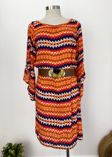 Load image into Gallery viewer, Brand: Bilgola Circa: 2015 Style: relaxed beach dress, with tie waist, split bell sleeves, knee length, beaded neckline Lined: no Preloved: yes Colour: multi/print - orange/navy Fabric: 100% Rayon Hand wash only Size S/M (Aus) shown with Frontier Bone Belt

