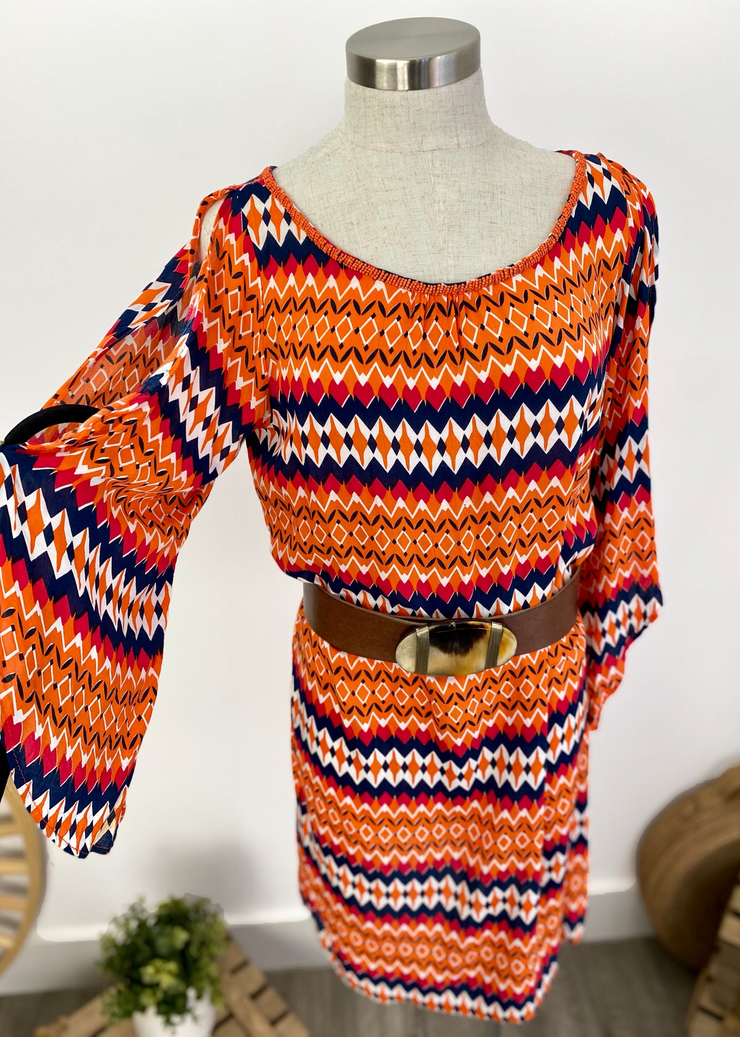 Brand: Bilgola Circa: 2015 Style: relaxed beach dress, with tie waist, split bell sleeves, knee length, beaded neckline Lined: no Preloved: yes Colour: multi/print - orange/navy Fabric: 100% Rayon Hand wash only Size S/M (Aus)