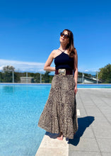 Load image into Gallery viewer, The Kitty Maxi Skirt / Dress will prove to be your ideal holiday outfit - lightweight and versatile, it can be worn many ways, either as a maxi skirt or dress.  The shirred top fits many bust sizes and can be secured further with the halter neck draw string.  Add a wide belt and change the style completely
