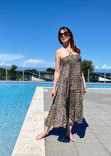 Load image into Gallery viewer, The Kitty Maxi Skirt / Dress will prove to be your ideal holiday outfit - lightweight and versatile, it can be worn many ways, either as a maxi skirt or dress.  The shirred top fits many bust sizes and can be secured further with the halter neck draw string.  Add a wide belt and change the style completely
