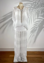 Load image into Gallery viewer, Keep it soft and feminine in these beautiful Italian made silk Primadonna Prima Pants in white on white Stripe.   The loose cut pants with a soft white on white stripe and wide jersey waistband, are fully lined and designed for relaxed style and comfort. 
