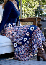 Load image into Gallery viewer, Inspired by beautiful Moroccan tiles, the ankle length Clara Skirt is made from a quality Indian cotton and features an exquisite embroidered navy panel around the hips and at mid length.  The embroidery is embellished with beading and buttons, and tiered with an exotic patterned fabric in a vibrant orange and blue to make for a really stunning skirt.
