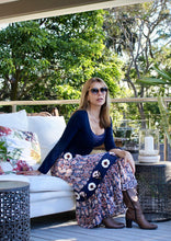 Load image into Gallery viewer, Inspired by beautiful Moroccan tiles, the ankle length Clara Skirt is made from a quality Indian cotton and features an exquisite embroidered navy panel around the hips and at mid length.  The embroidery is embellished with beading and buttons, and tiered with an exotic patterned fabric in a vibrant orange and blue to make for a really stunning skirt.
