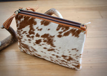 Load image into Gallery viewer, beautiful soft cowhide bag is the ideal everyday handbag. Made from genuine leather,  featuring cowhide on front panel, this roomy handbag has 2 large zipped main compartments, an open pocket compartment plus a secure external zipped pocket.  Internal compartment features 5 card pockets and an open phone pocket. 
