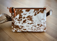 Load image into Gallery viewer, beautiful soft cowhide bag is the ideal everyday handbag. Made from genuine leather,  featuring cowhide on front panel, this roomy handbag has 2 large zipped main compartments, an open pocket compartment plus a secure external zipped pocket.  Internal compartment features 5 card pockets and an open phone pocket. 
