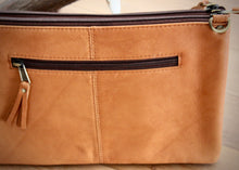 Load image into Gallery viewer, beautiful soft cowhide bag is the ideal everyday handbag. Made from genuine leather,  featuring cowhide on front panel, this roomy handbag has 2 large zipped main compartments, an open pocket compartment plus a secure external zipped pocket.  Internal compartment features 5 card pockets and an open phone pocket. 
