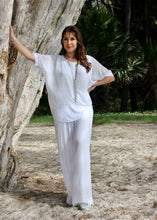 Load image into Gallery viewer, Keep it soft and feminine in these beautiful Italian made silk Primadonna Prima Pants in white on white Stripe.   The loose cut pants with a soft white on white stripe and wide jersey waistband, are fully lined and designed for relaxed style and comfort. 
