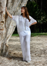 Load image into Gallery viewer, Keep it soft and feminine in these beautiful Italian made silk Primadonna Prima Pants in white on white Stripe.   The loose cut pants with a soft white on white stripe and wide jersey waistband, are fully lined and designed for relaxed style and comfort. 
