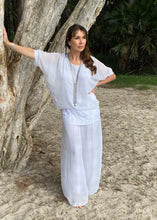 Load image into Gallery viewer, Keep it soft and feminine in these beautiful Italian made silk Primadonna Prima Pants in white on white Stripe.   The loose cut pants with a soft white on white stripe and wide jersey waistband, are fully lined and designed for relaxed style and comfort. 
