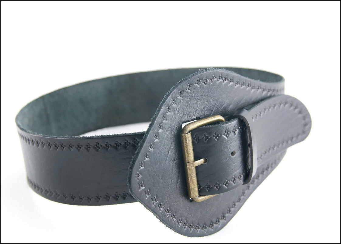 Absolutely on trend, is the Babushka Wide Tapered Leather Belt. Wide at the front tapering to fit through the brass buckle with a beautiful hand stamped detail. Made to be worn at the waist but can be worn on the hips 
