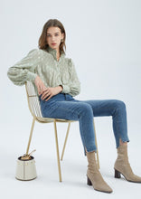 Load image into Gallery viewer, The stunning Isla Pleated blouse, beautifully made with cuffed full length sleeves, a frill neck and statement gold buttons down the front.  An abstract graphic design adorns this blouse with pleats and delicate gold elements add to the wow factor of this design.  Pair with jeans, or with tailored trousers or skirt for a more formal look.  For women who want to look elegant and effortlessly stylish from desk to dinner. 
