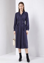 Load image into Gallery viewer, Another stunning and luxurious dress by GDS, the Aiden Tie Waist Dress is crafted of a rich Tencel/linen blend, a mid-weight fabric with a beautiful soft sheen and touch. Featuring an adjustable corset inspired string tie at the front which creates an exceptionally flattering shape.  The fabric falls beautifully with soft, graceful movement.  With a sophisticated mandarin collar, hidden buttons and soft pleats at the front, this beautifully tailored dress is designed to create a gorgeous silhouette.

