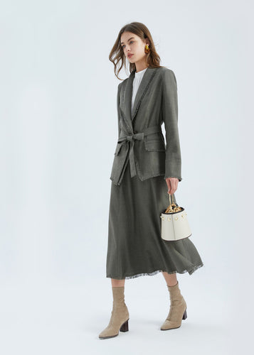 The Ada Jacket is a relaxed blazer-style jacket, in a beautiful Linen blend fabric, in 2 subtle earthy tones.  GDS design principles reflect a mix between business and casual fashion, with a feminine and elevated approach to clothing in high-quality materials.  The Ada jacket cuts a flattering figure, a cinched waist with a matching belt and single large button.  The collar, hem, pockets and cuffs are frayed at the edges, which adds a gorgeous bohemian touch to a timeless silhouette.