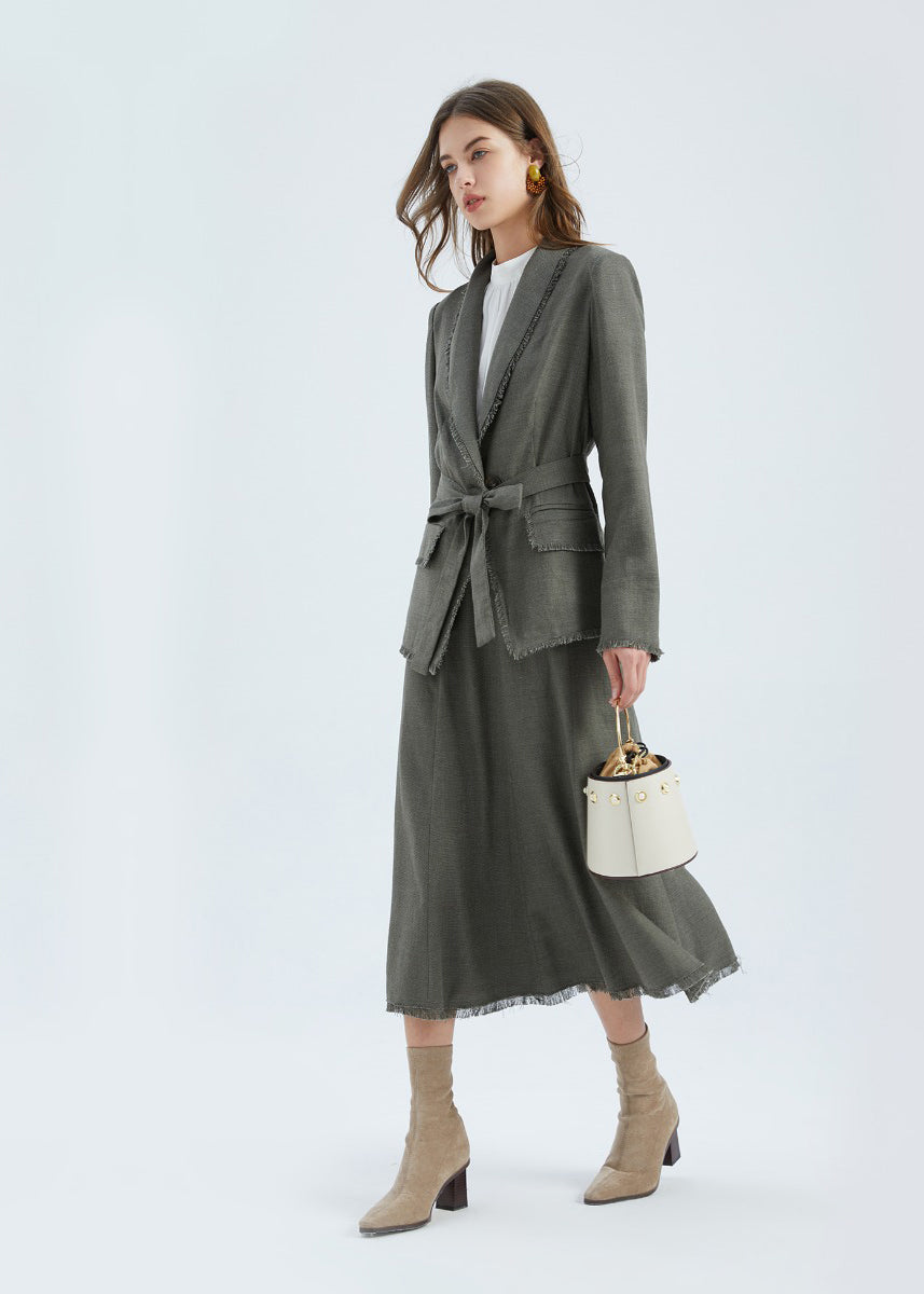 The Ada Jacket is a relaxed blazer-style jacket, in a beautiful Linen blend fabric, in 2 subtle earthy tones.  GDS design principles reflect a mix between business and casual fashion, with a feminine and elevated approach to clothing in high-quality materials.  The Ada jacket cuts a flattering figure, a cinched waist with a matching belt and single large button.  The collar, hem, pockets and cuffs are frayed at the edges, which adds a gorgeous bohemian touch to a timeless silhouette.