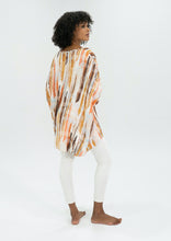 Load image into Gallery viewer, The Basic Top by Caro The Label, is another best seller.   In a gorgeous print of earthy tones that represent the colours of outback Australia.  Crafted from soft 100% Rayon fabric is lightweight and cool, slightly longer at the back and loose flowing, perfect with jeans or leggings, even shorts.  3/4 length wide sleeves create a relaxed but flattering shape that can be dressed up or down, for the beach or the bar!
