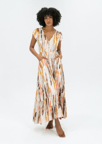 The Emily Dress by Caro, in a gorgeous print of earthy tones that represent the colours of outback Australia. The soft 100% Rayon fabric is lightweight and cool, and the loose flowing skirt has a pretty oversized tier.  it is buttoned down the front so can be worn open layered over shorts, jeans or buttoned up as a dress.  Delicate cap sleeves, a gathered waist and a V neckline create a flattering silhouette, and pockets give it a relaxed feel. 
