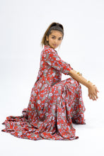 Load image into Gallery viewer, The Skye Maxi shirt dress is a gorgeous full length maxi dress, featuring a wide tiered section at the hem and side slits either side.  With a stylish shirt collar, buttoned to the chest with a seam under the bust and 3/4 cuffed sleeves. The skirt has generous volume with so much fabric, which is soft and floaty in a gorgeous red floral print.  Can be worn belted or loose with pockets
